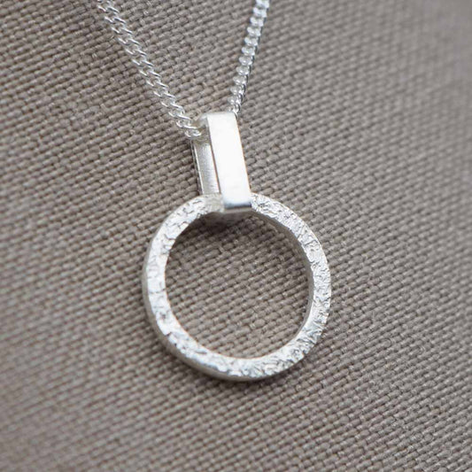 Textured small round pendant on a rectangle link