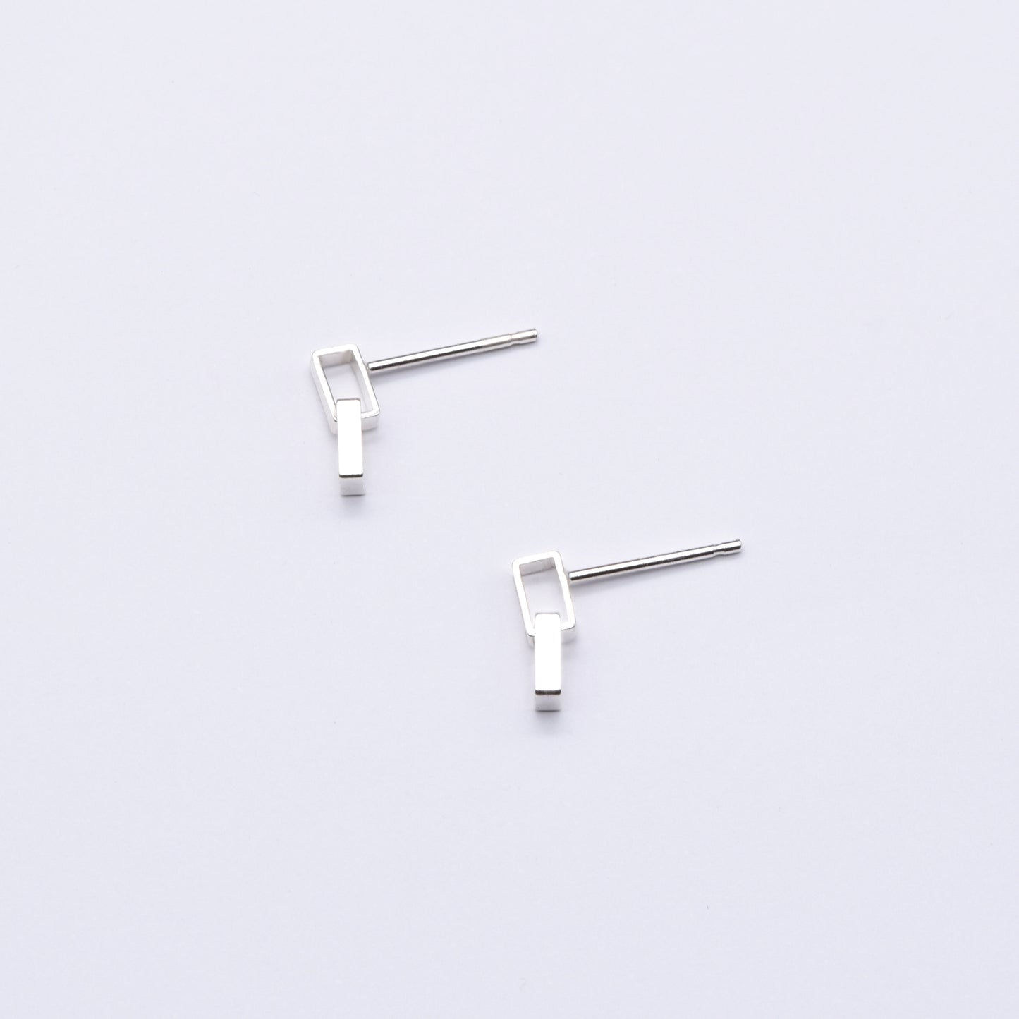 Simple silver geometric stud earrings