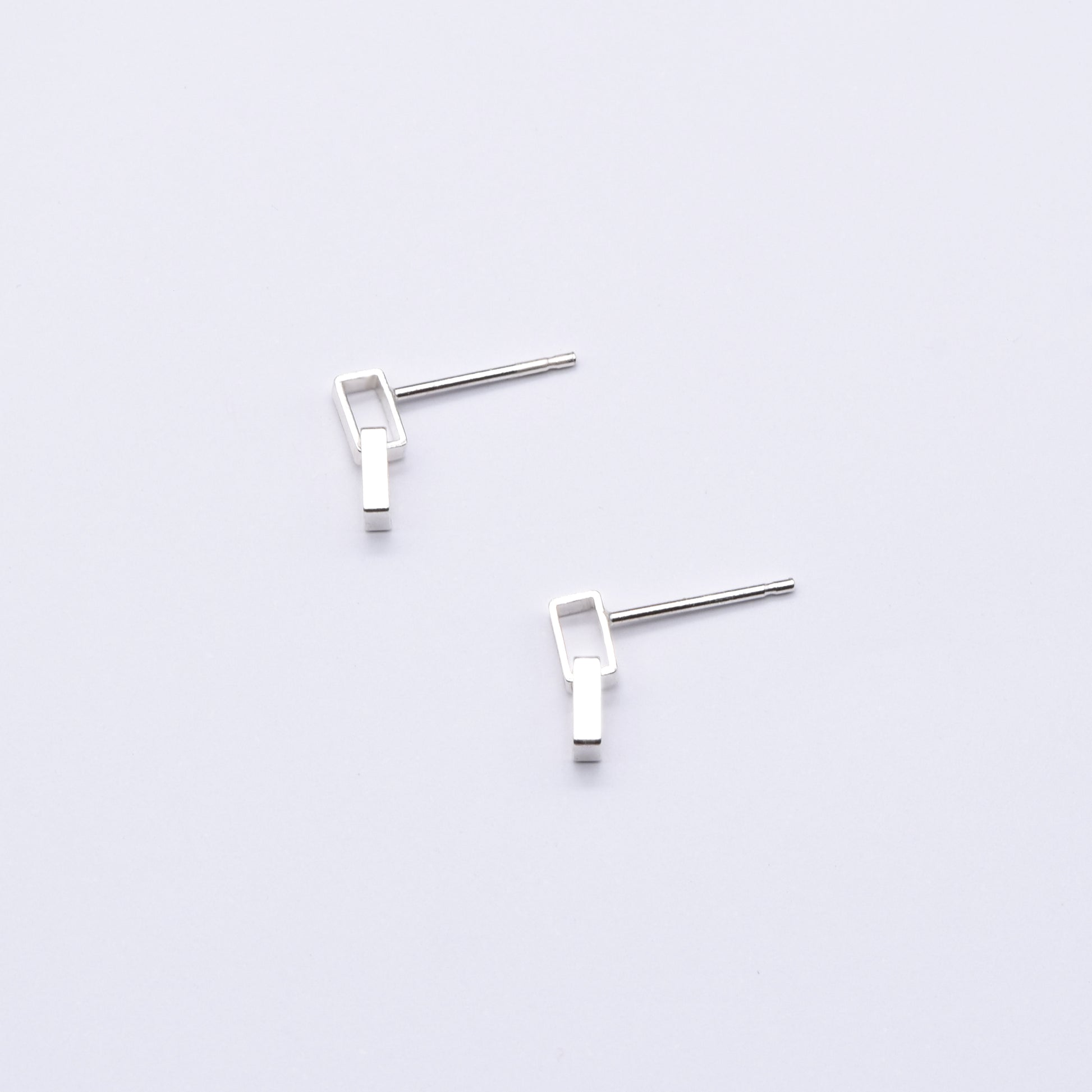 Simple silver geometric stud earrings